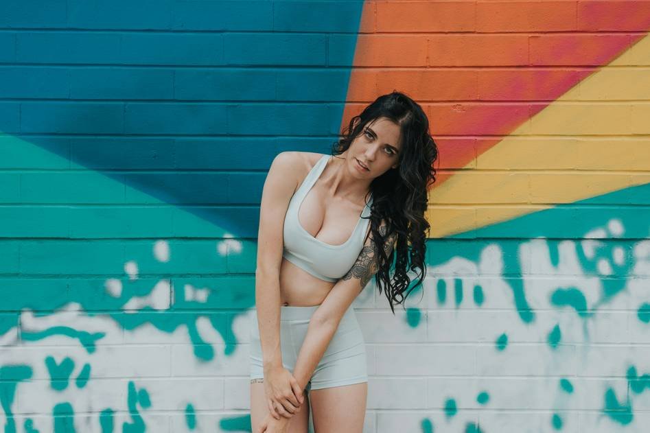 A group of climbers in vibrant tights preparing for an outdoor ascent