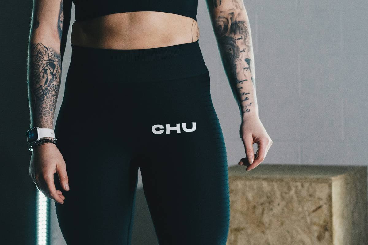 Side-by-side comparison: generic tights slipping vs. climbing-specific tights with wide, bonded waistband staying secure during overhead reach