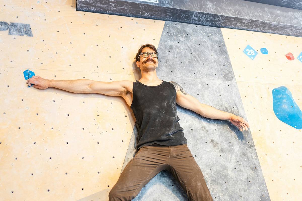 Climber demonstrating deep active hip mobility during flexibility climbing drill