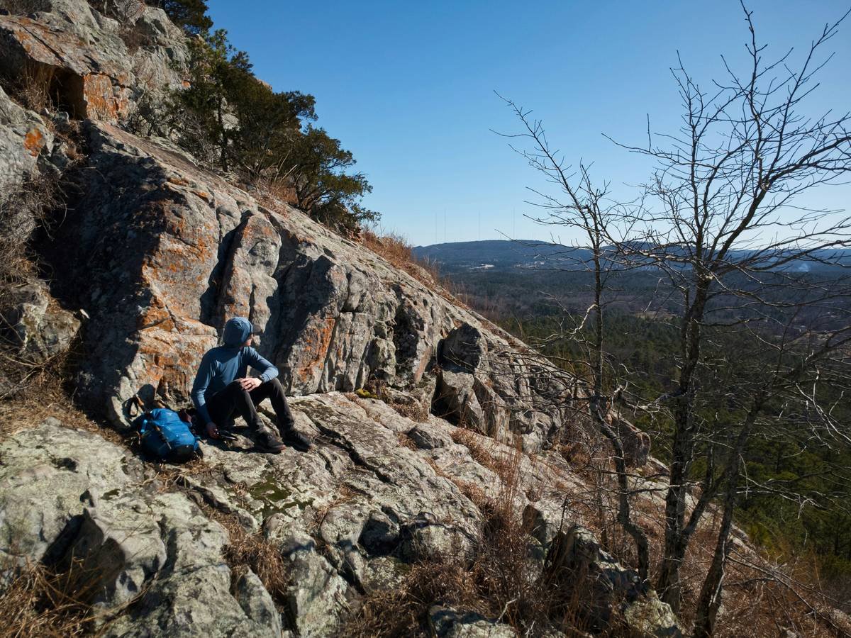 Climber mid-route wearing ergonomic climbing tights for optimal climbing comfort