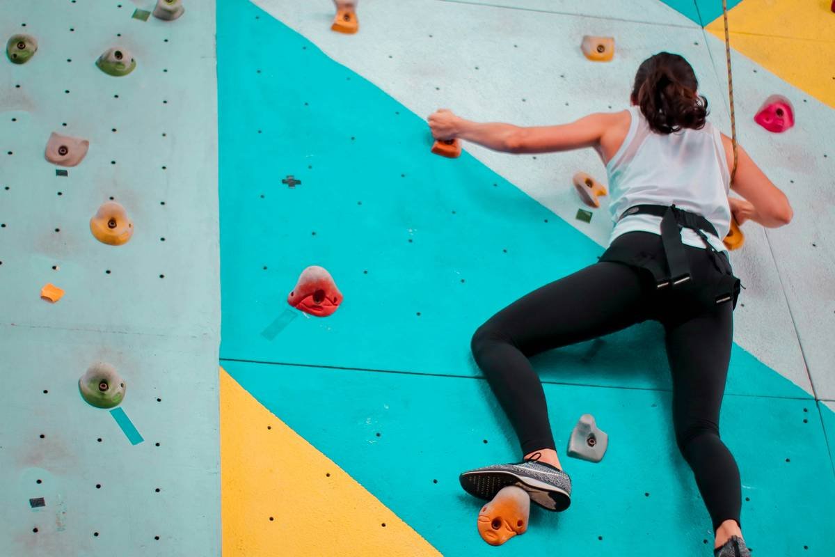 Close-up of advanced climbing tights showing seamless design and grip zones for enhanced climbing comfort